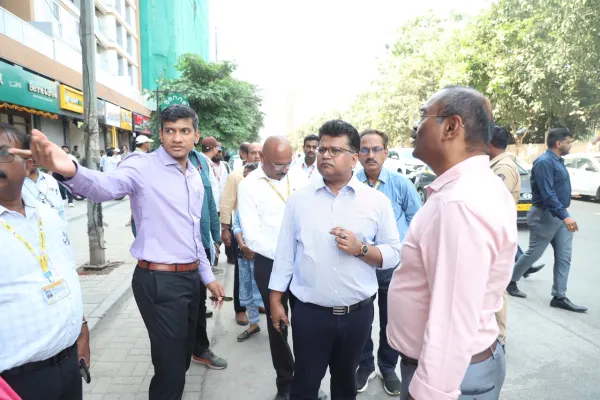 PMC Commissioner Naval Kishor Ram and officials inspect a road to Pune Airport