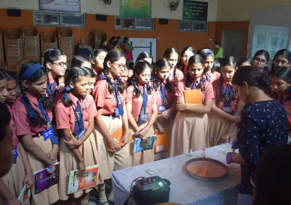 A science demonstration for school girls
