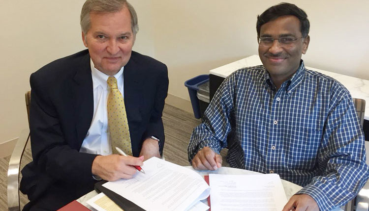 Dr. Michael R. Gibbons & Mr. Vikram Limaye
